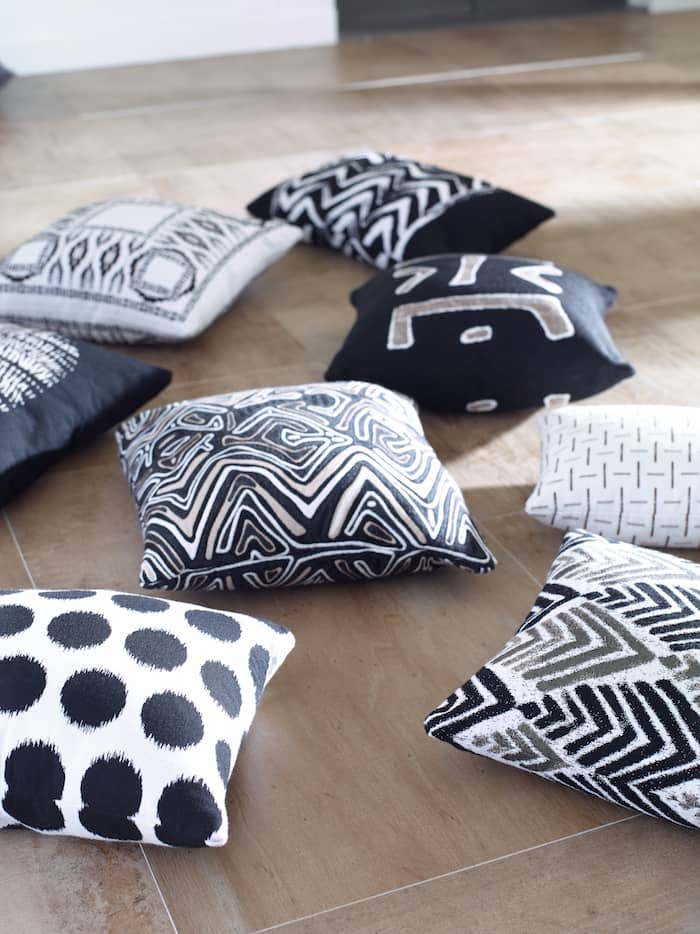 There are many ways to easily decorate a room with a black and white design with Sunbrella fabrics, like these striking decorative pillows from Mitchell Gold + Bob Williams.