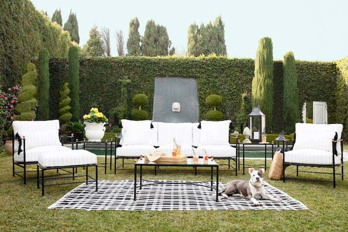 The combination of black and white is a long-trusted design staple, used by One Kings Lane in a stunning Sunbrella outdoor lounge set. Photo courtesy of One Kings Lane