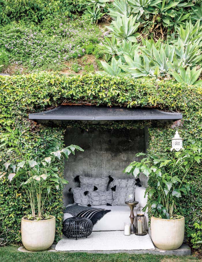 Black and white Sunbrella fabric in this outdoor nook makes the natural elements really pop. Copyright © 2020 Sunset Publishing Corporation, photo by Thomas J. Story, SUNSET is a registered trademark of Sunset Publishing Corporation and is used with permission