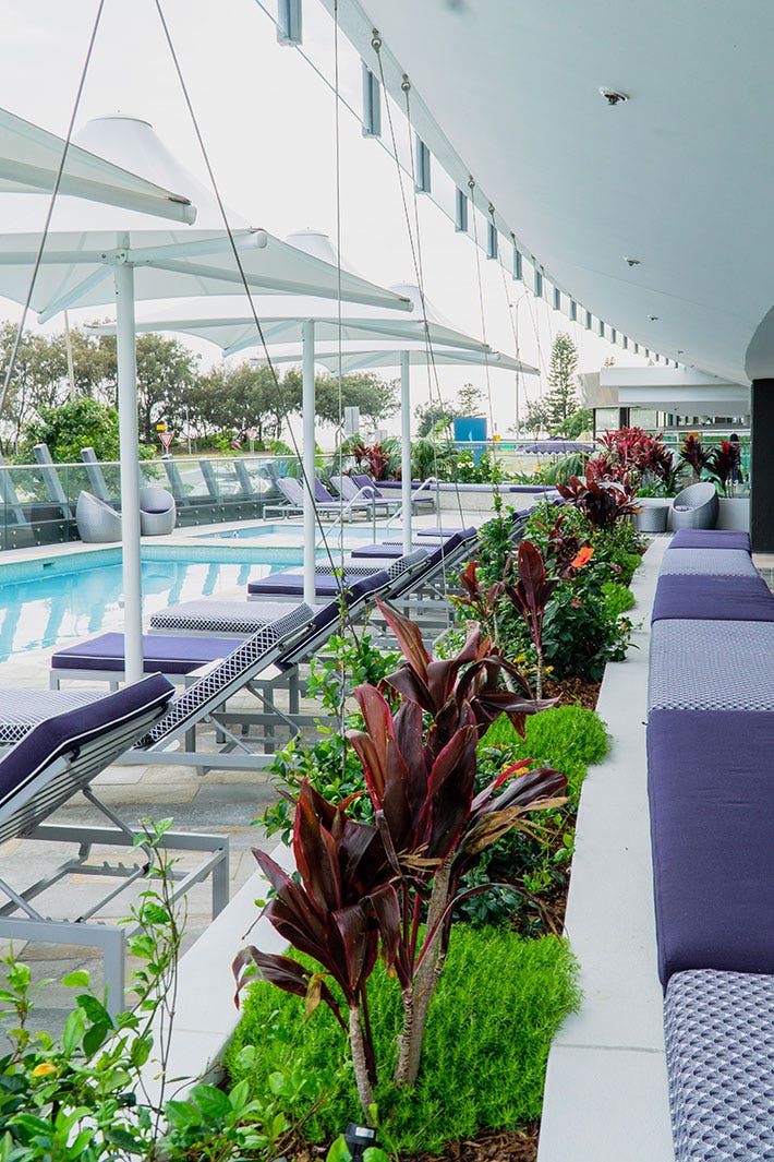 poolside restaurant with blue upholstery