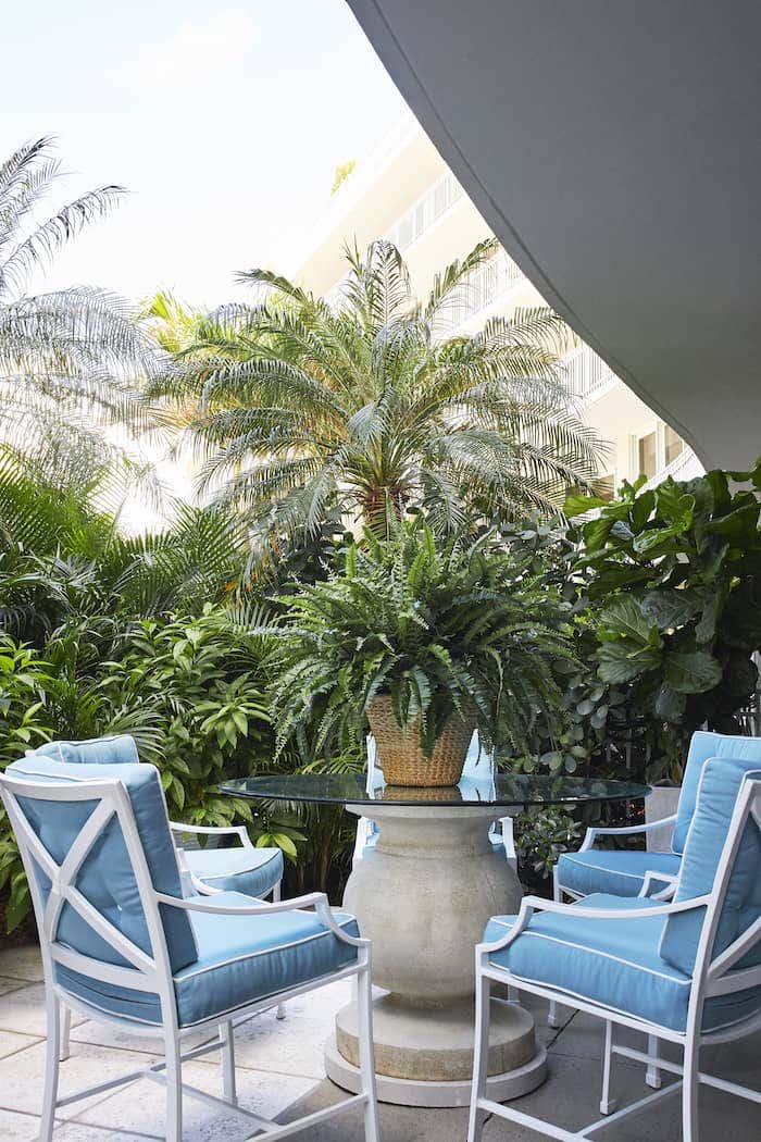 Sunbrella fabrics make outdoor seating areas as beautiful as they are functional, such as this one from Rollins pied-a-terre in Palm Beach, Fla. Courtesy of Carmel Brantley Photography