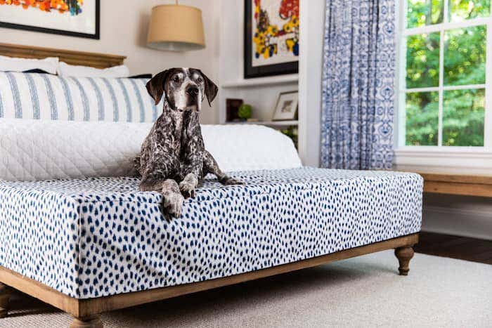 This ottoman was built for the family’s dog, Babaloo, to jump up on the bed, so Lauren elected a stylish fabric that could still withstand the family’s lifestyle.