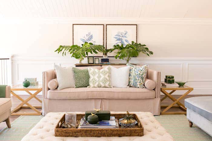 Natalee combined coastal blue and sage green fabrics to create a snug vignette, and used neutral colored Sunbrella x 3Beaches fabrics to make the living spaces extra durable.