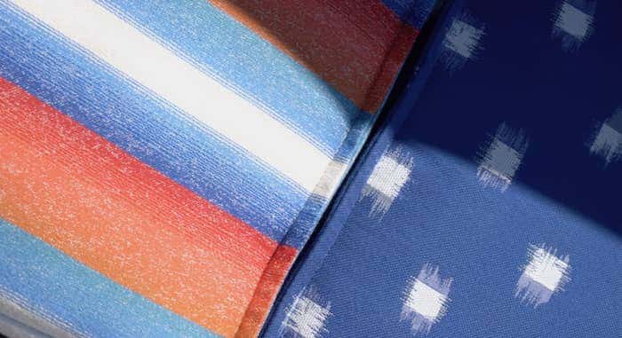 Rachel pulls vivid Sunbrella fabrics to incorporate bold colors in her designs, such as Ombre Horizons and Ikat Blocks