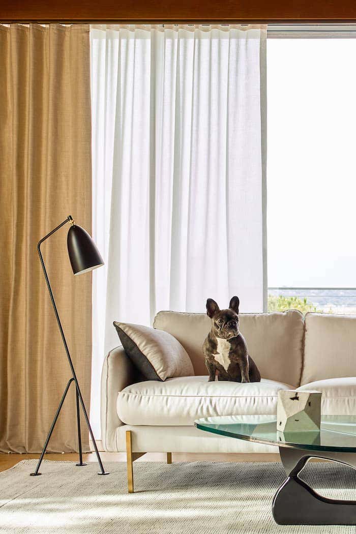 Curtains made with Sunbrella fabric add chic style to your family room while equipping your home with powerful performance and fade resistance