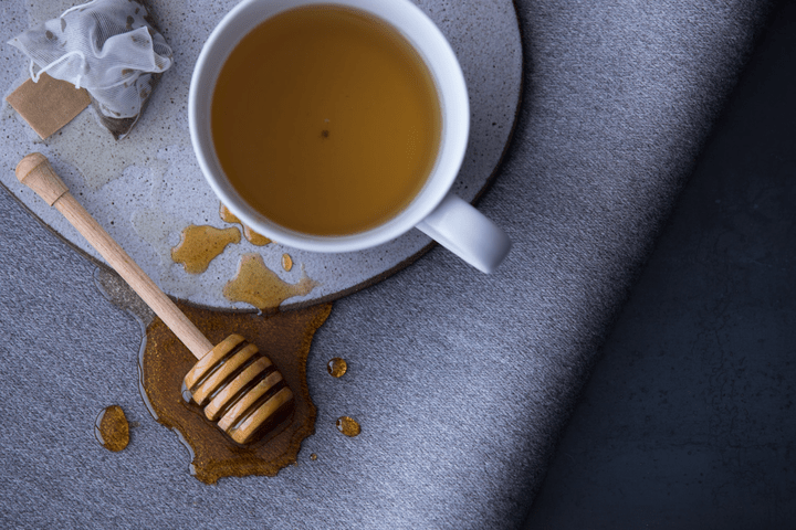 Wondering how to clean a fabric dining chair? There’s no need to cry over honey and tea spilled on your favorite seat. Just follow these easy steps and this blue Sunbrella upholstered performance fabric will look like new.