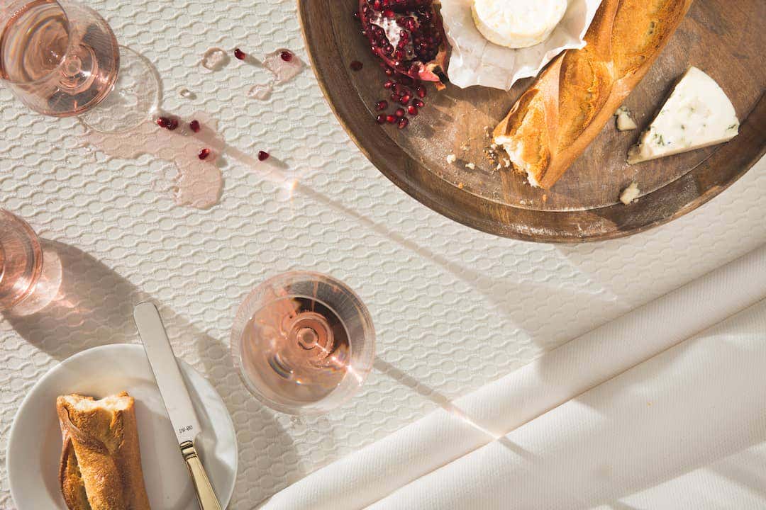 Wine and charcuterie are no match for the performance of Sunbrella fabrics.