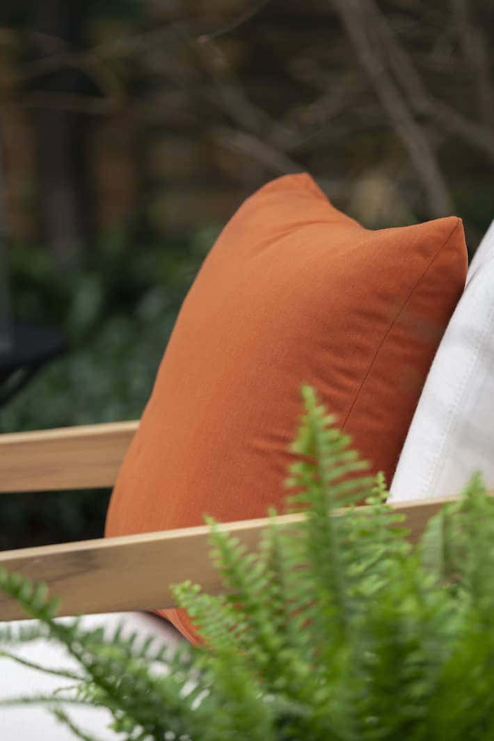 Incorporate Sunbrella fabrics to transition your porch to fall.