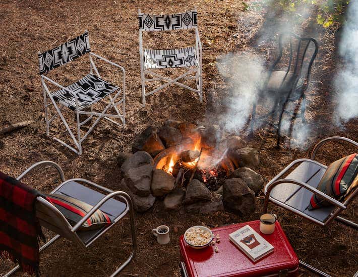 Elevate your fireside seating with Sunbrella performance fabric.