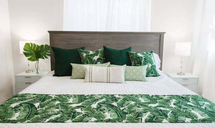 Green With Envy incorporates bold organic prints with interlocking bamboo patterns to breath vibrance and life into your space.