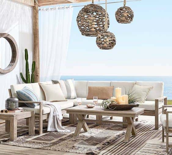 The Indio Sectional from Pottery Barn transforms your outdoor patio into a serene sanctuary with the softness of Sunbrella fabric, perfect for lounging the day away.