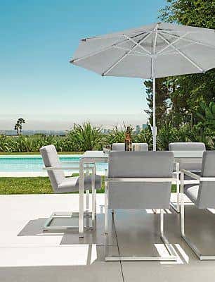 Room and Boards Oahu Patio Umbrella works equally well on its own or paired with an outdoor dining table.