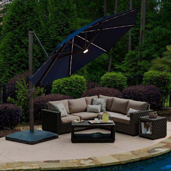 The Seasons Sentry LED Solar Round Cantilever Umbrella from Costco goes from day to night with solar-powered LED lights