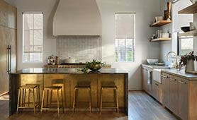 Kitchen windows featuring Sunbrella solar/roller shades