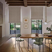 Dining room with roman shade in Colton Fawn