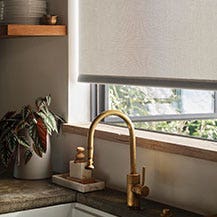 Kitchen window with solar shade in Sol Rice