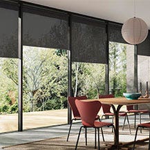 Dining room with solar shades in Sol Midnight