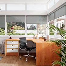 Home office with solar shades in Luminos Slate