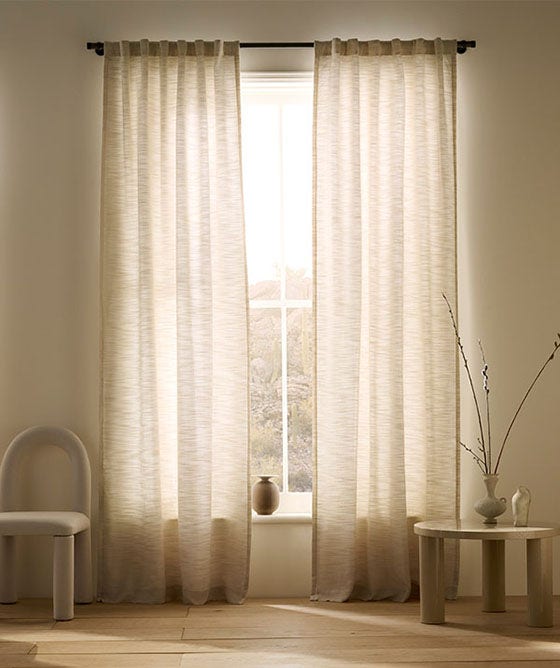 Window feature Sunbrella stocked draperies