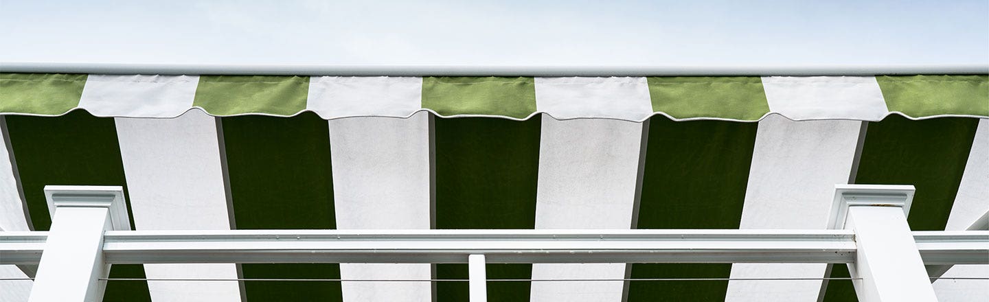 Closeup of green and white awning