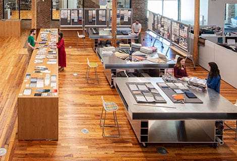 designers at large tables in sunbrella headquarters