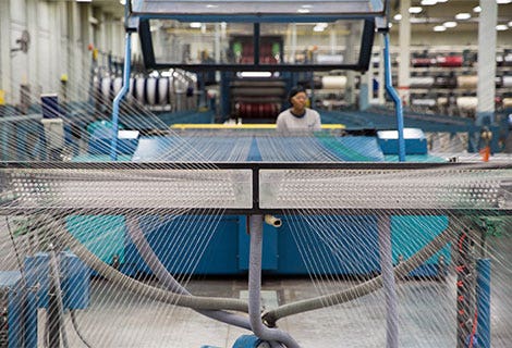 fabric loom in sunbrella manufacturing facility